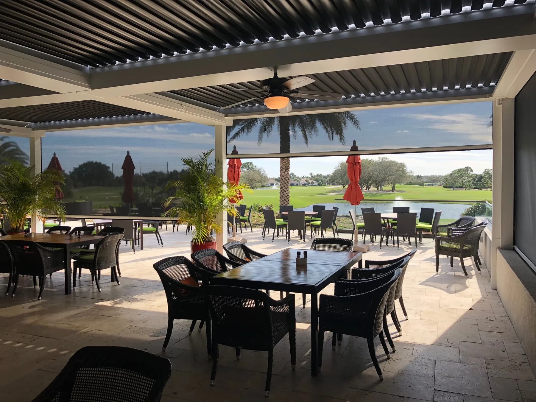 Retractable screen system spanning a large residential patio opening